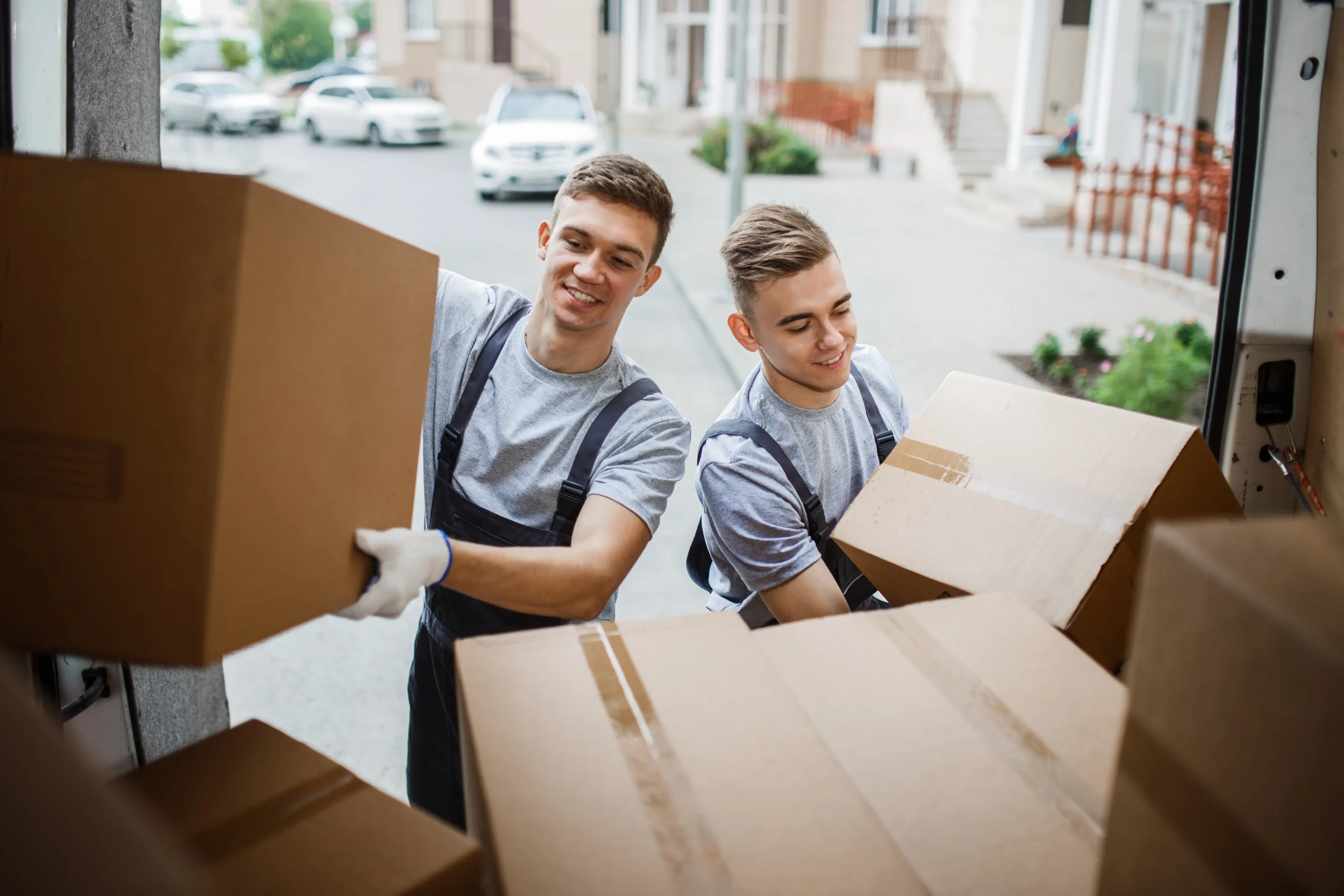 movers moving boxes scaled